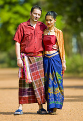 Image showing caucasian and asian with traditional thai clothes