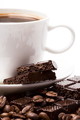 Image showing cup of coffee, beans and black chocolate