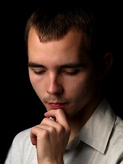 Image showing Young man thinking