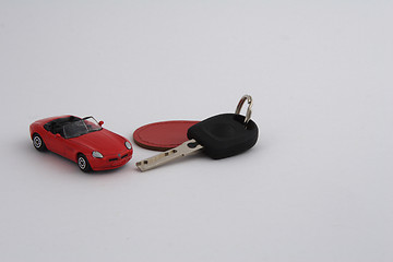 Image showing Toy car and car key