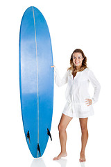 Image showing Woman with a surfboard