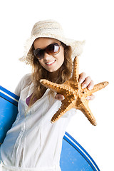 Image showing Woman with a surfboard