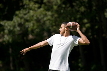 Image showing Tossing the Fooball