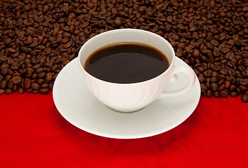 Image showing Coffee cup over red background