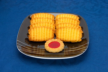 Image showing cookies on a Plate on a blue background