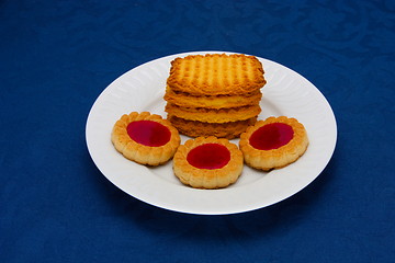 Image showing cookies on a Plate on a blue background