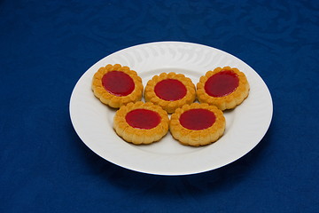 Image showing cookies on a Plate on a blue background