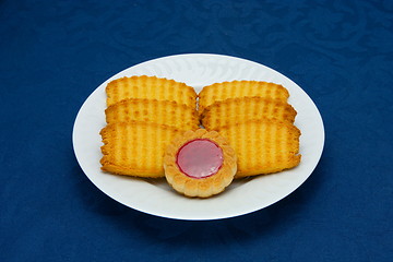 Image showing cookies on a Plate on a blue background