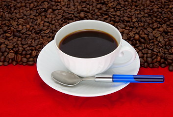 Image showing Coffee cup over red background