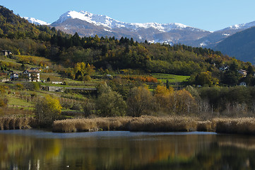 Image showing Autumn landscape with lake and mountains