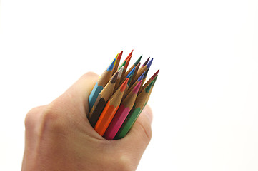 Image showing Hold a dozen color pencils 