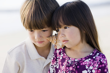 Image showing Two Children With Shell