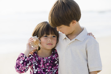 Image showing Two Children With Shell