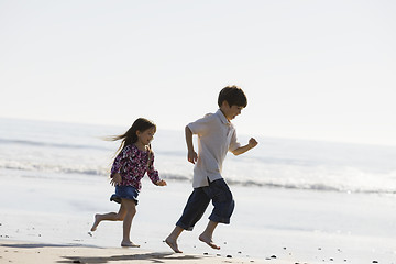 Image showing Kids Running on Beach