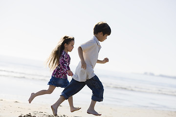 Image showing Kids Running on Beach