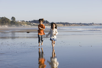 Image showing Children Running on Beach