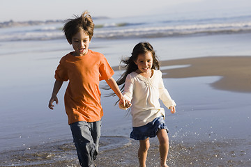 Image showing Children Running on Beach