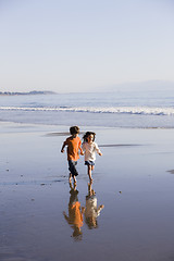 Image showing Children Running on Beach