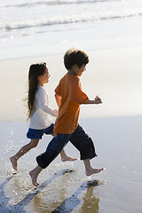 Image showing Children Running on Beach