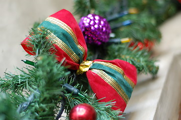 Image showing red, gold, and green holiday ribbon