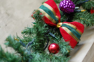 Image showing red, gold, and green holiday ribbon