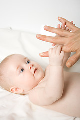 Image showing Baby hold mothers hand