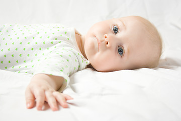 Image showing Cute baby looks at you