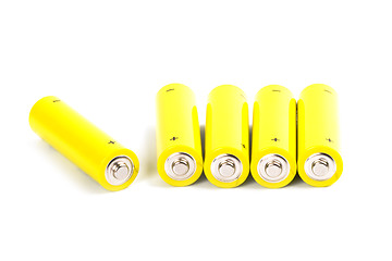 Image showing five yellow alkaline batteries