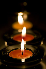 Image showing three candles flaming