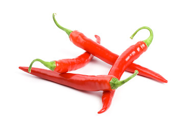 Image showing four red chilly peppers