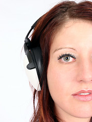 Image showing Woman listening to her favorite music