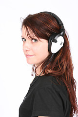 Image showing Woman listening to her favorite music