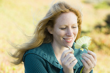 Image showing Woman Outdoors With Flower