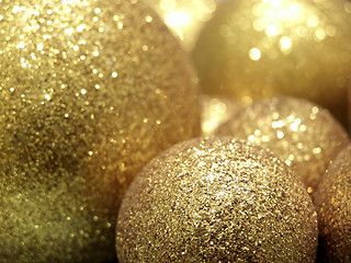 Image showing Gold baubles