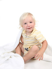 Image showing Cute Caucasian Baby Boy Sitting on White