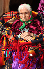 Image showing Old Navajo Woman Deep in Thought With Hands Crossed