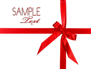 Image showing Big Red Holiday Bow Package on White Background