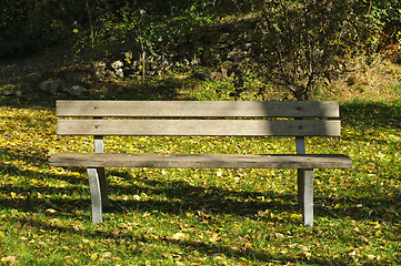 Image showing Empty park bench