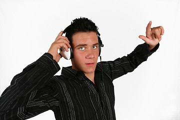 Image showing DJ  listening to his favorite music