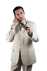 Image showing Businessman on the PDA phone with an ear piece