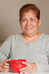 Image showing Smiling friendly senior woman