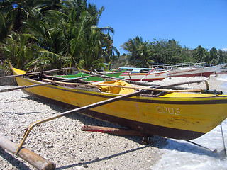 Image showing fishing boats on the beach near puerta galera the philippines