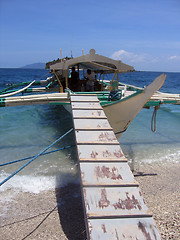 Image showing boarding a banca near puerto galera mindoro philippines