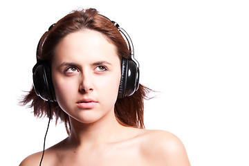 Image showing Beautiful woman listening music