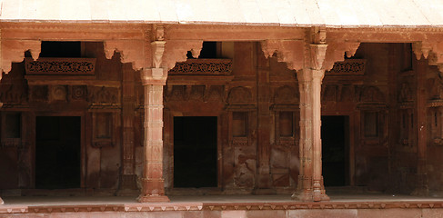 Image showing Empty corridor with handcarved pillars in Fatehpur Sikri complex