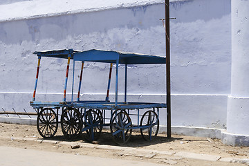 Image showing Pair of blue wooden market carts in the streets of Pushkar, Indi