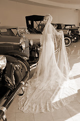 Image showing Bride and antique cars