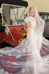 Image showing Bride and antique car