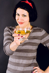 Image showing attractive girl drinking vine