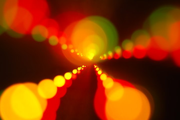 Image showing Christmas lights glowing (blur motion background)